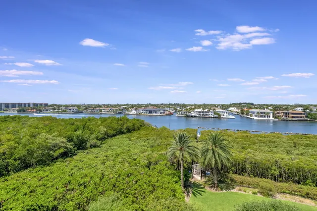 a view of building with yard and staircase