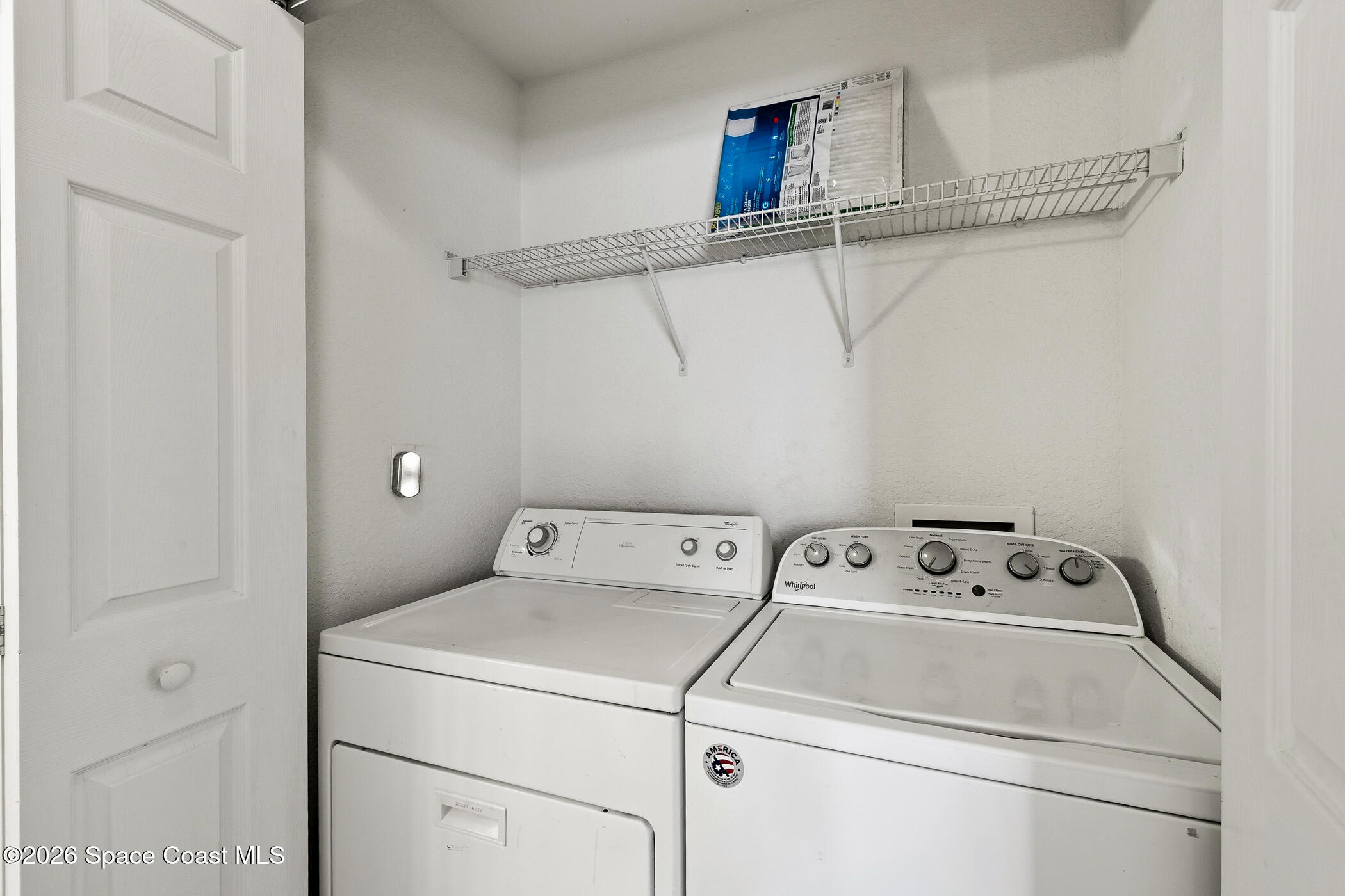 110 Colibri Way, Unit 103 Melbourne, FL 32901 - Photo 16 of 16 Upstairs Laundry
