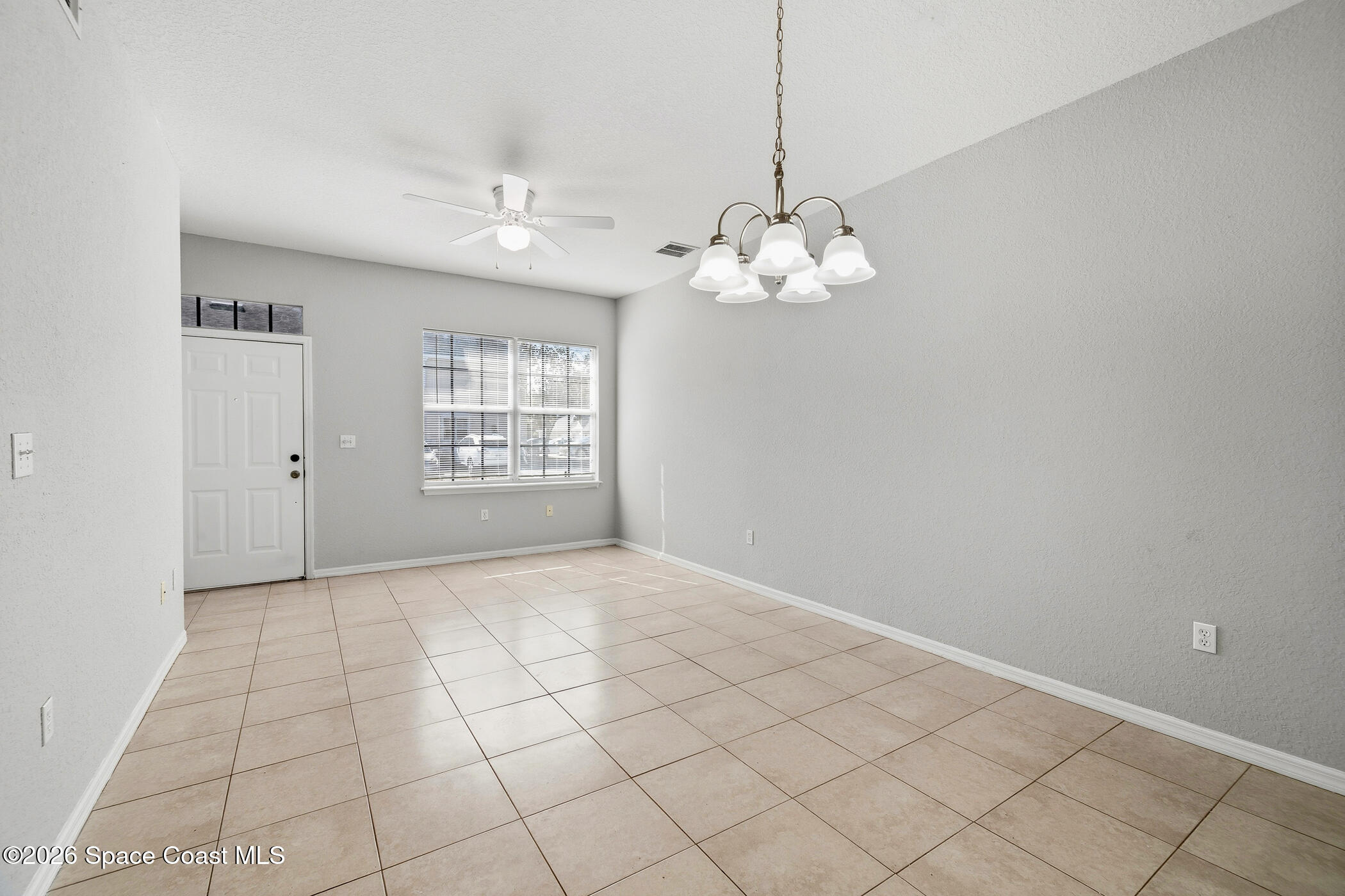 110 Colibri Way, Unit 103 Melbourne, FL 32901 - Photo 2 of 16 Living Dining Combo