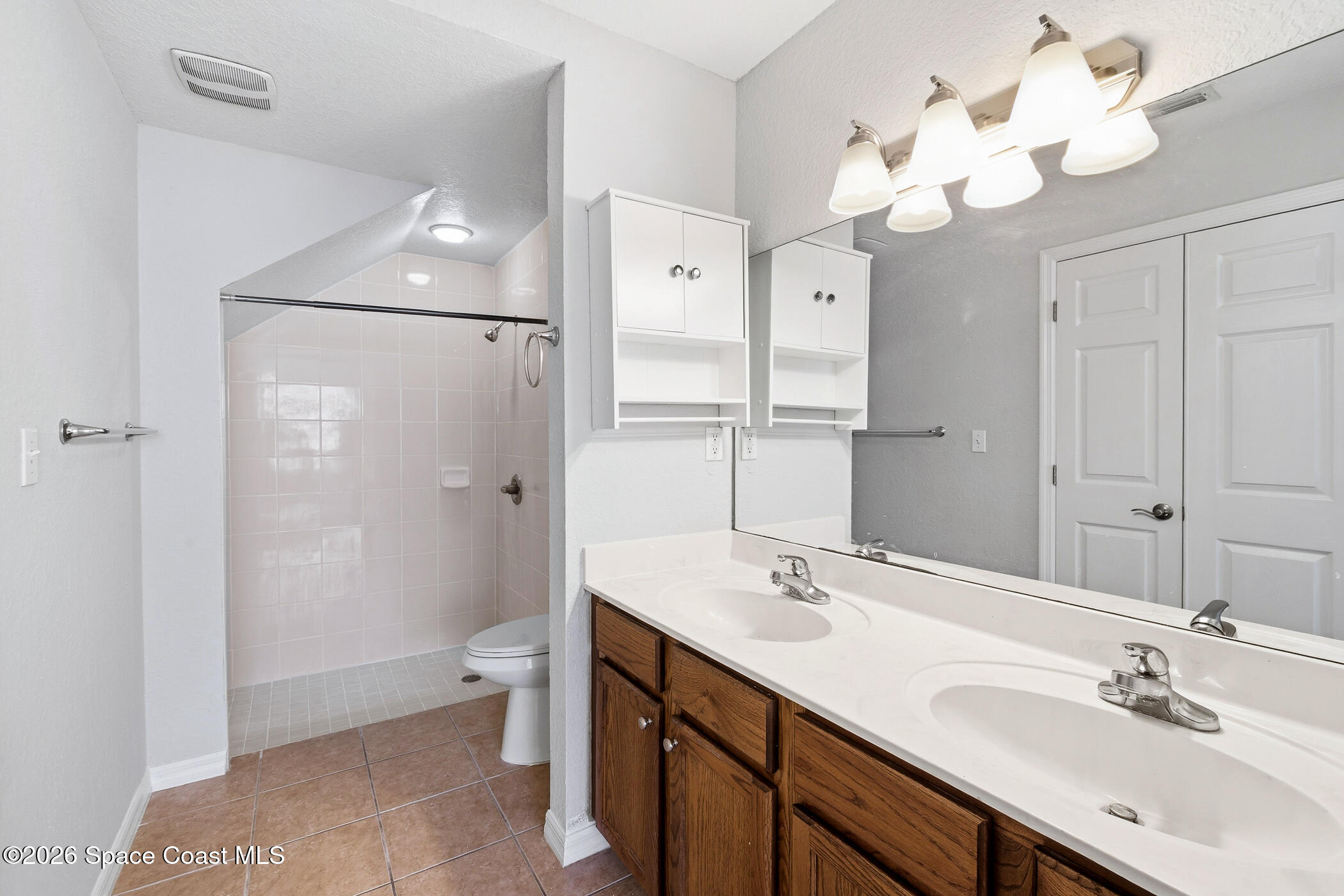 110 Colibri Way, Unit 103 Melbourne, FL 32901 - Photo 10 of 16 Primary Bathroom