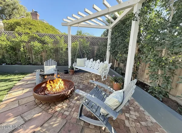 an outdoor space with furniture