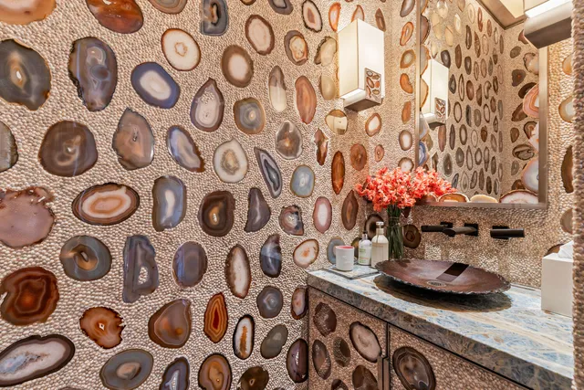 a view of a chair and table in the backyard