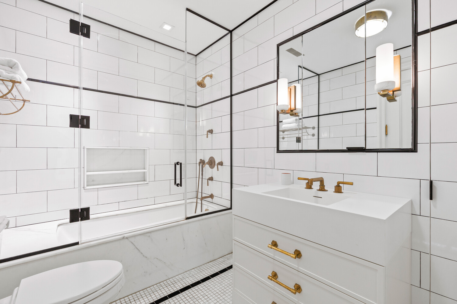 116 East 70th Street Manhattan, NY 10021 - Photo 19 of 22 a bathroom with a sink and a shower