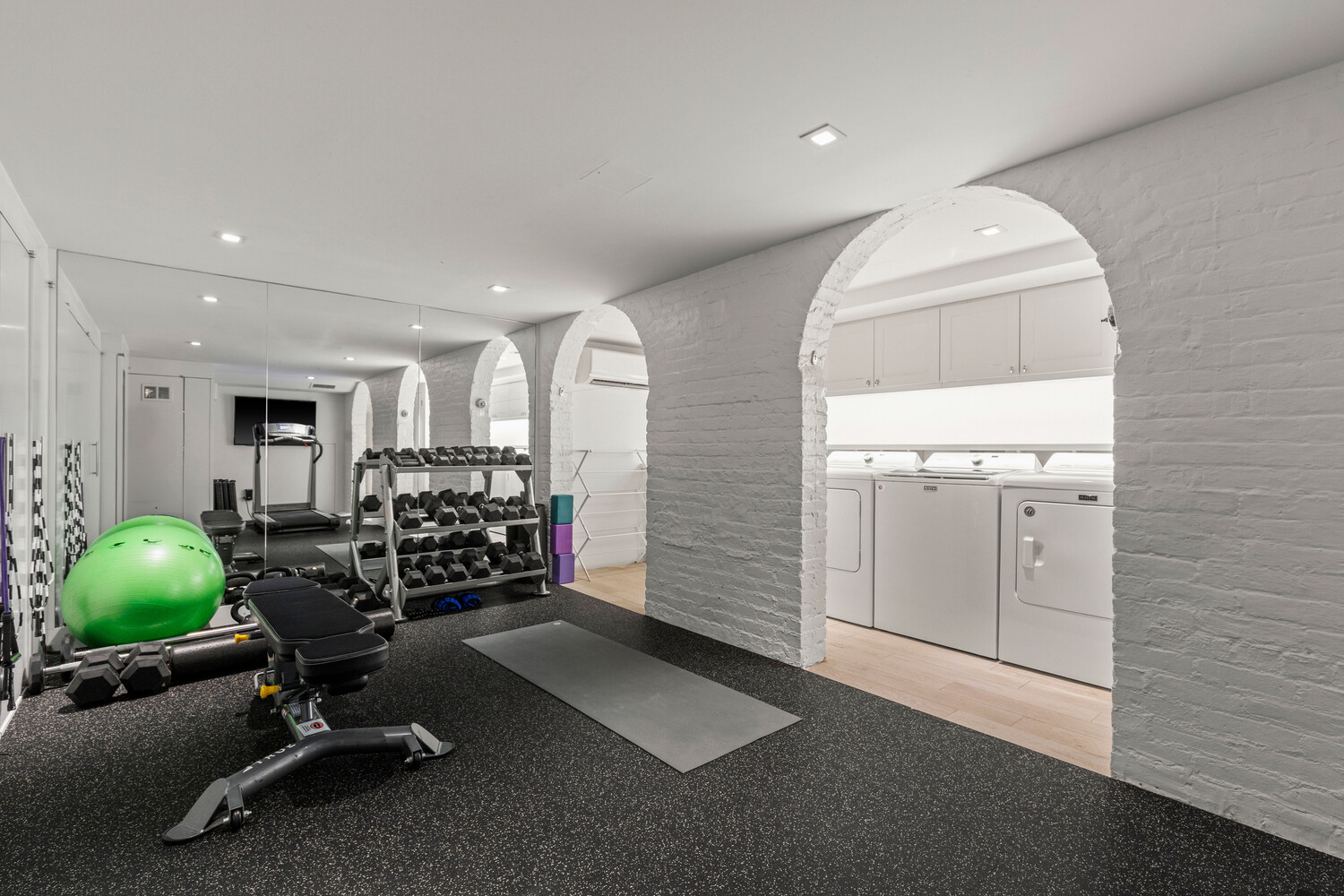 116 East 70th Street Manhattan, NY 10021 - Photo 21 of 22 a view of a room with gym equipment