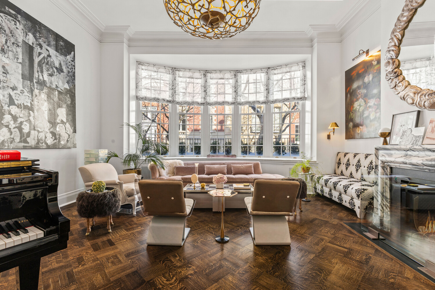 116 East 70th Street Manhattan, NY 10021 - Photo 8 of 22 a living room with furniture large window and a table