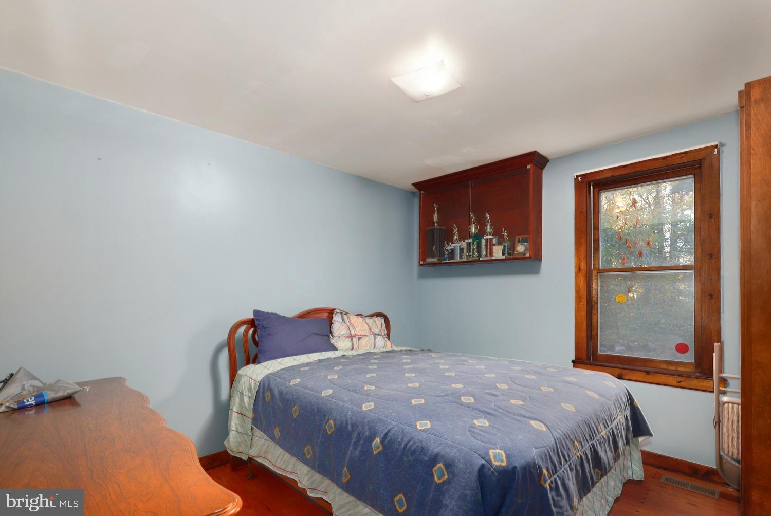 13138 Mt Paran Church Road Linden, VA 22642 - Photo 12 of 33 a bedroom with a bed and wooden floor