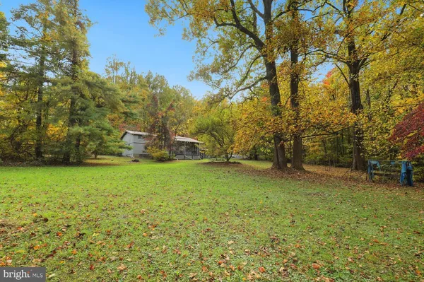 a house with trees in front of it