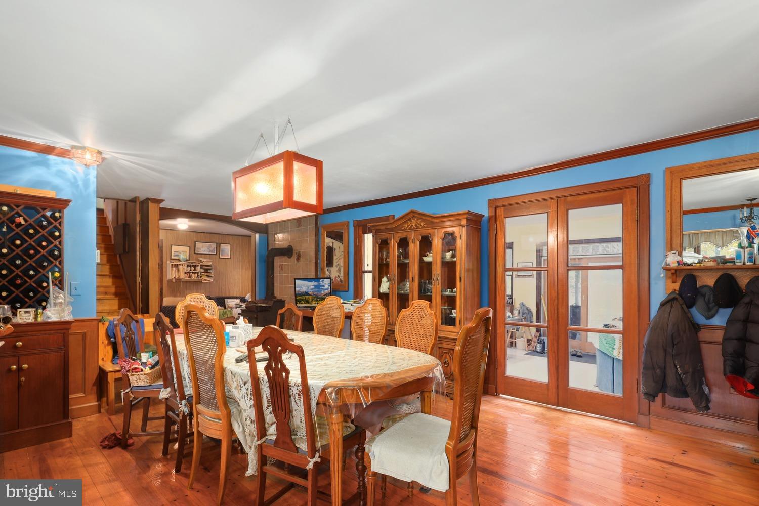 13138 Mt Paran Church Road Linden, VA 22642 - Photo 10 of 33 a view of a dining room with furniture window and wooden floor