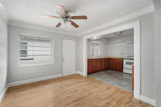 a view of an empty room with a window