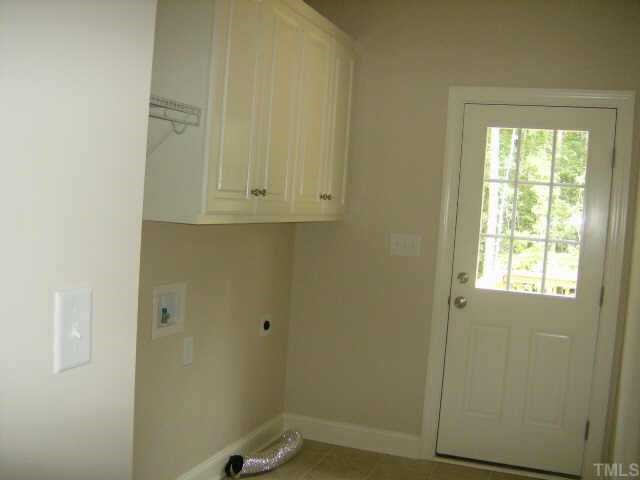 135 Piney Forest Road Roxboro, NC 27574 - Photo 5 of 10 a view of cabinets and window