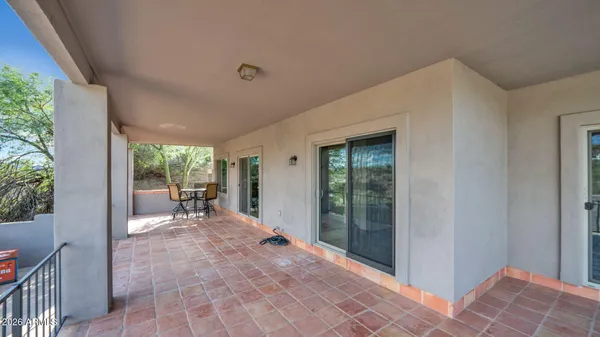 a bathroom with a shower and a sink