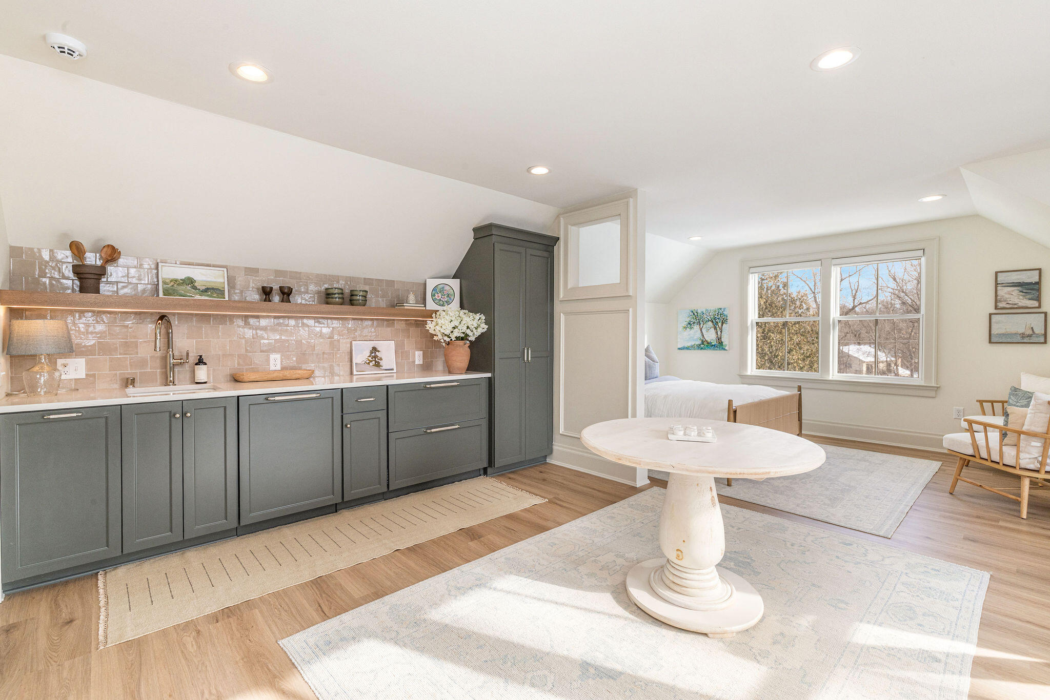 545 Wisconsin Avenue Delafield, WI 53018 - Photo 18 of 24 This oversized bedroom is great as an in-law or guest suite. Kitchenette, with dishwasher, refrigerator, and freezer drawers.