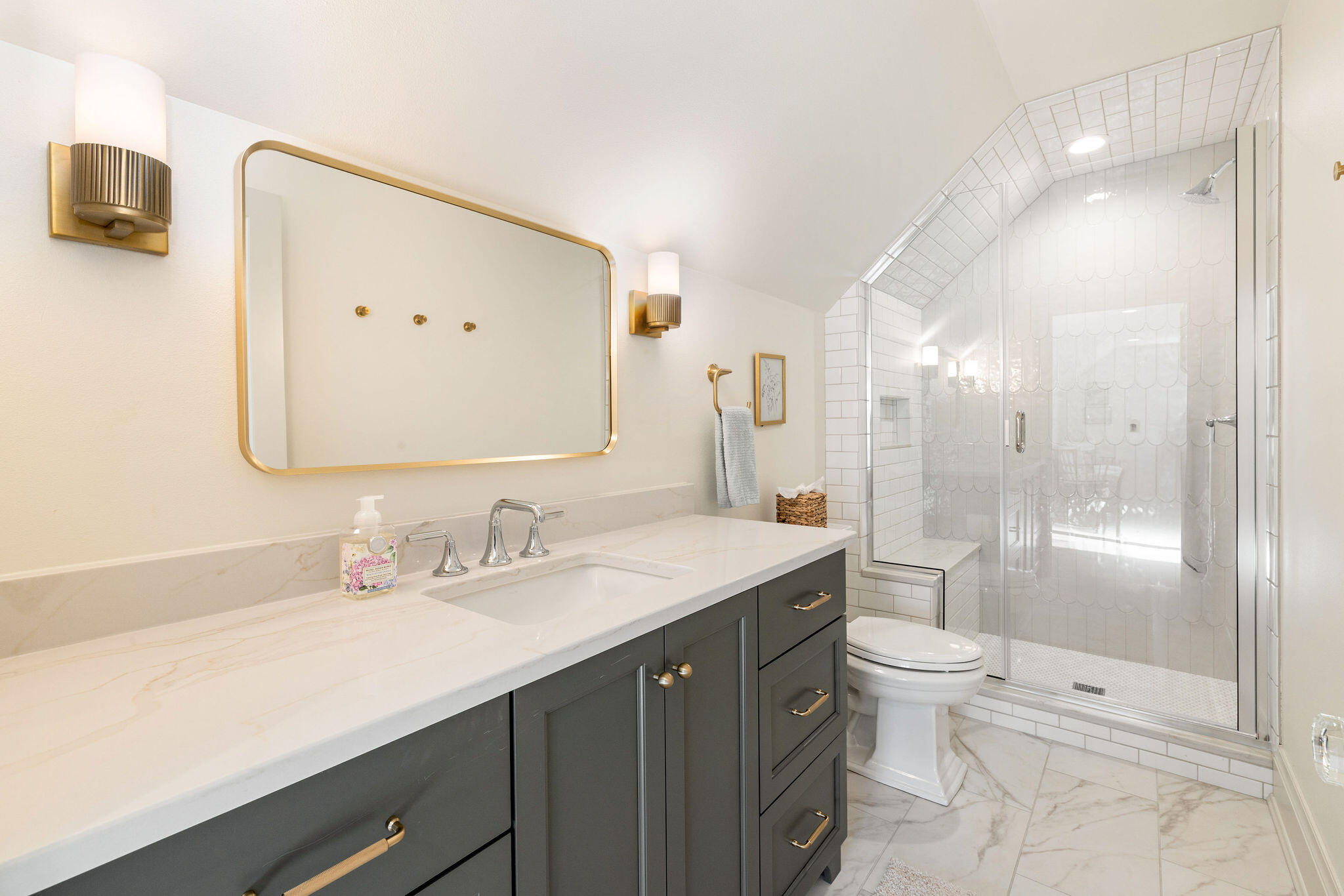 545 Wisconsin Avenue Delafield, WI 53018 - Photo 19 of 24 Quartz countertops and Tile flooring and shower.
