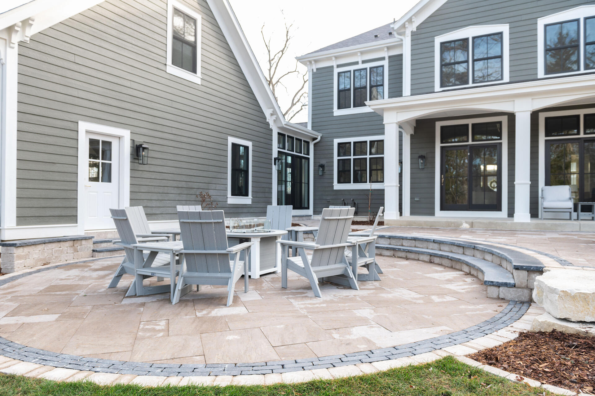 545 Wisconsin Avenue Delafield, WI 53018 - Photo 22 of 24 Beautiful hardscape and landcaping. The HOA takes care of the lawn, raingarden and snow removal!