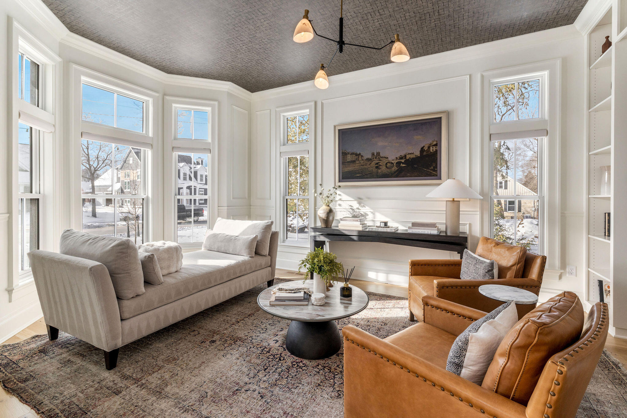 545 Wisconsin Avenue Delafield, WI 53018 - Photo 3 of 24 Built-ins, Crown moulding, Frame TV and a Bay Window brings in abundant natural light.
