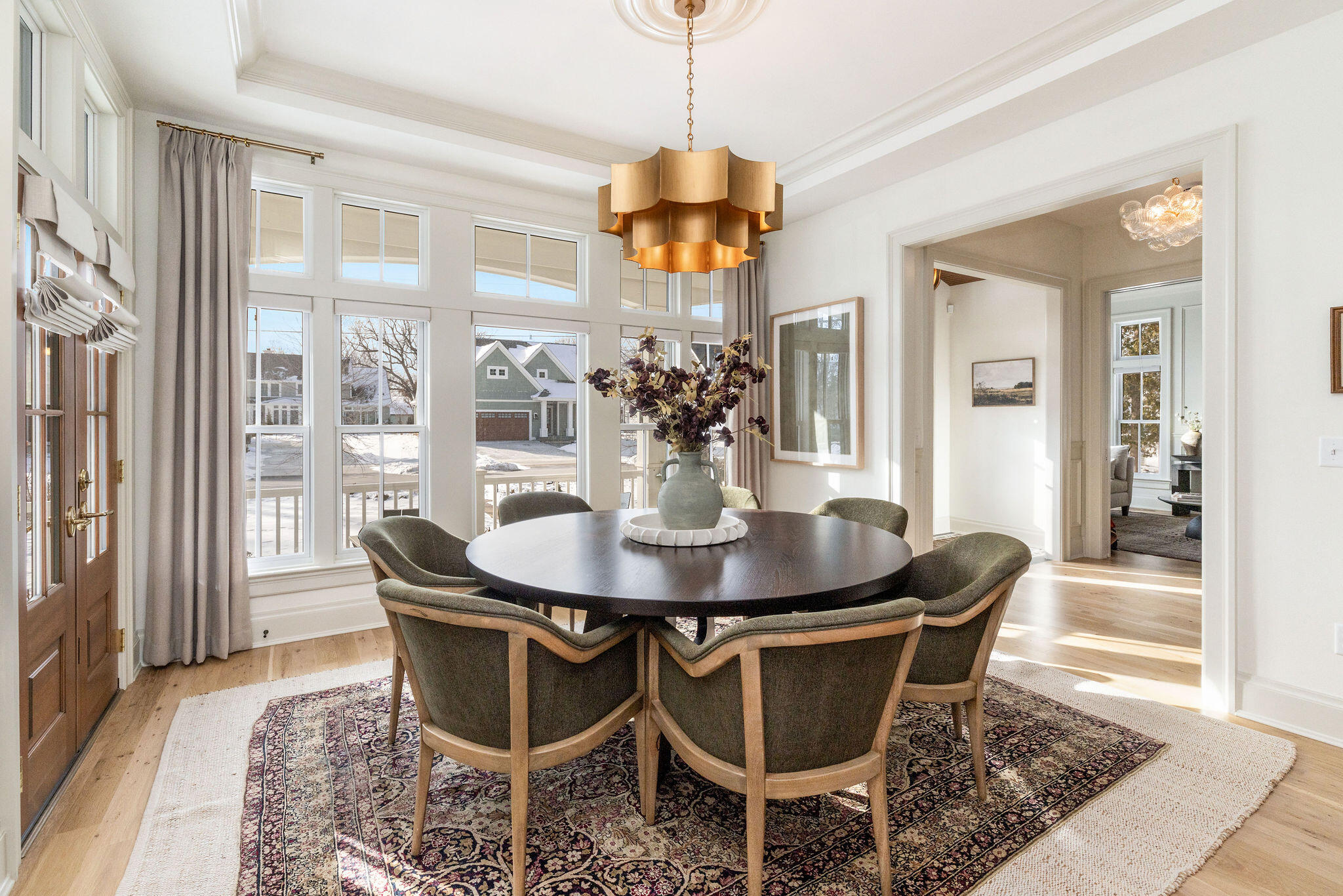 545 Wisconsin Avenue Delafield, WI 53018 - Photo 4 of 24 Sunlit and open to the kitchen for effortless entertaining.