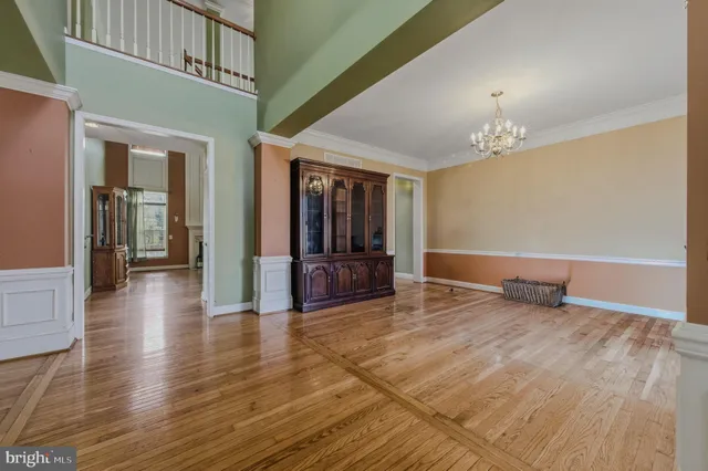 a view of a living room with furniture and window