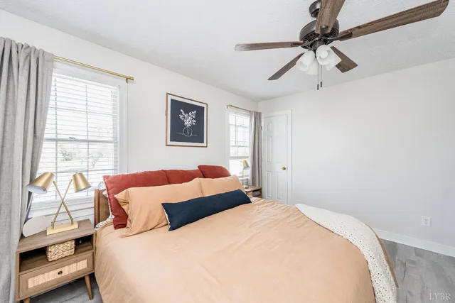 a view of a livingroom with furniture and a flat screen tv