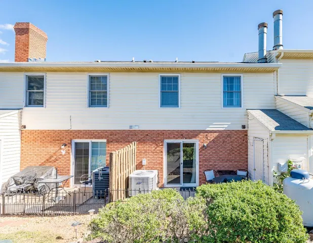 a house view with a swimming pool