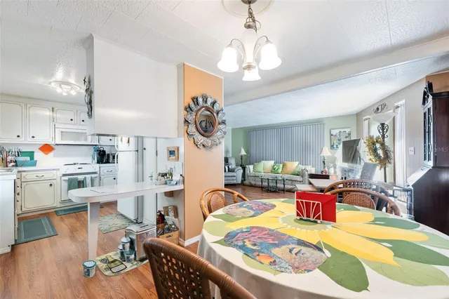 a view of a dining room with furniture