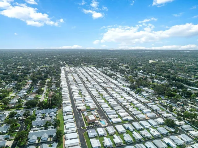 a view of balcony with wooden floor