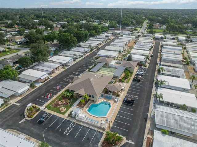a view of a swimming pool with a patio