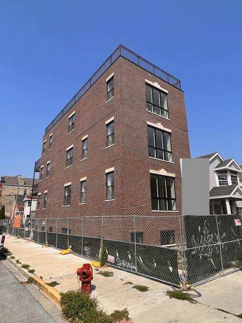 1624 South Carpenter Street, Unit 1 Chicago, IL 60608 - Photo 1 of 6 a front view of a building