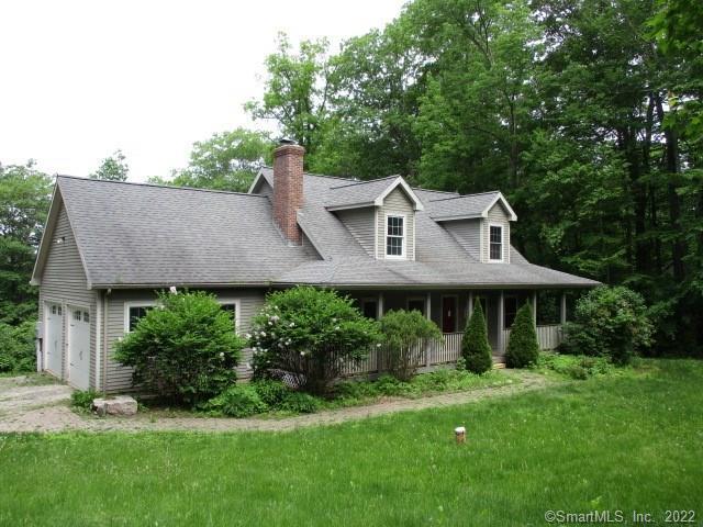 173 N Road Harwinton, CT 06791 - Photo 1 of 1 a front view of a house with a garden