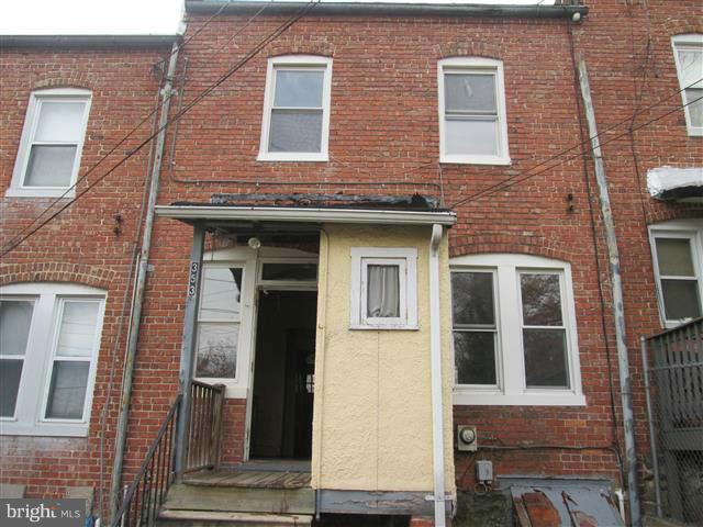 353 Marydell Road Baltimore, MD 21229 - Photo 2 of 20 a view of brick building with many windows