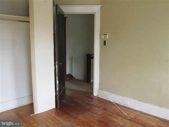353 Marydell Road Baltimore, MD 21229 - Photo 15 of 20 a view of a hallway with wooden floor