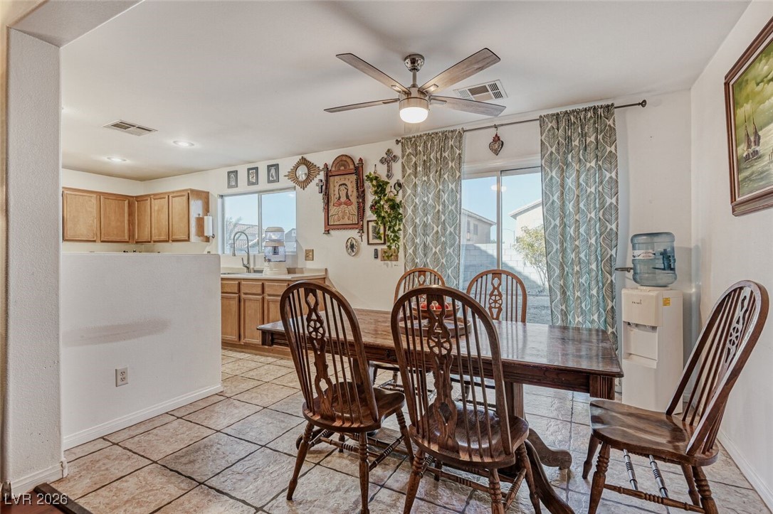 2046 Peacemaker Road Las Vegas, NV 89183 - Photo 5 of 17 Dining Room open to the Living Room and Kitchen.