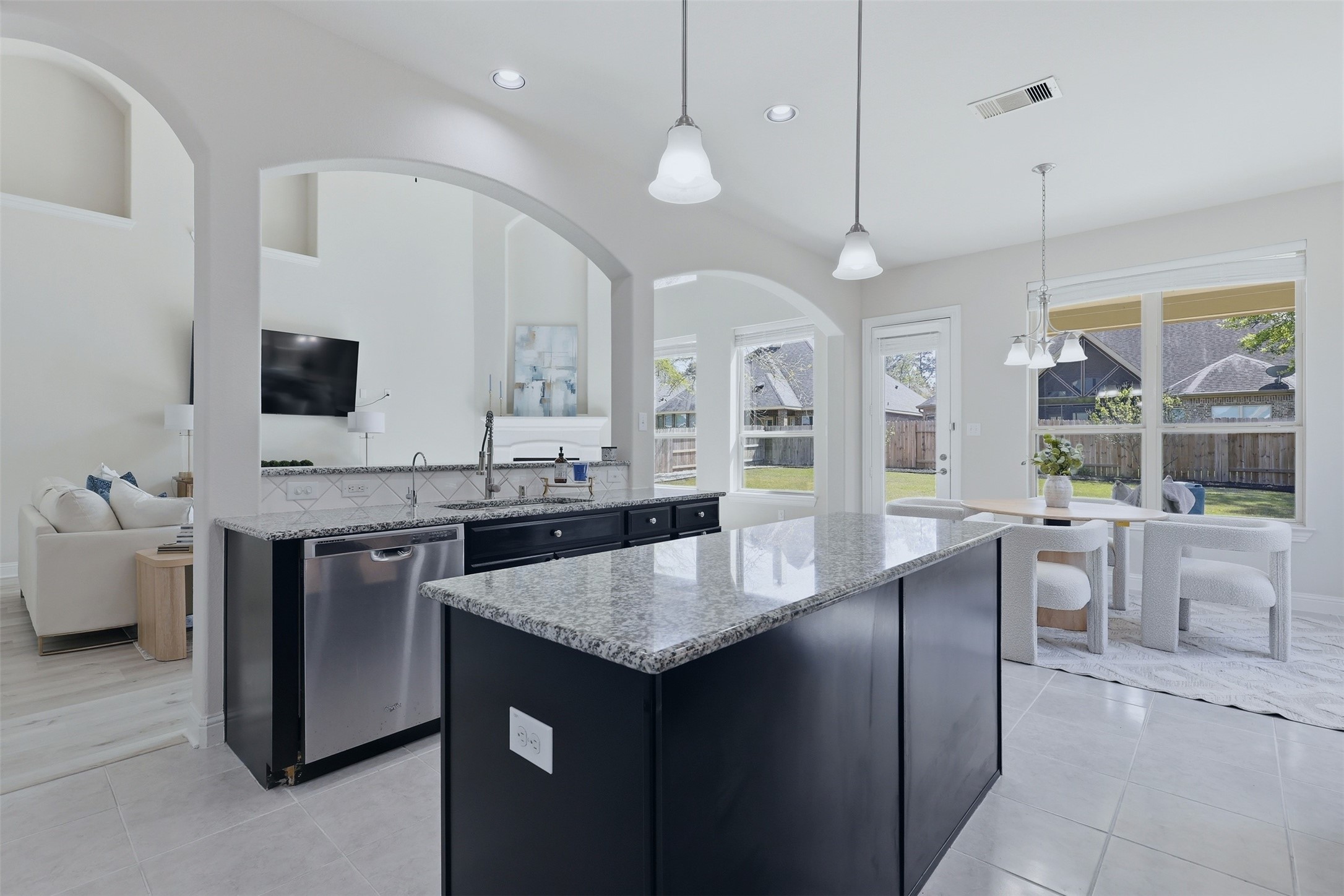 9926 Common Hawker Court Conroe, TX 77385 - Photo 13 of 40 SPACIOUS island