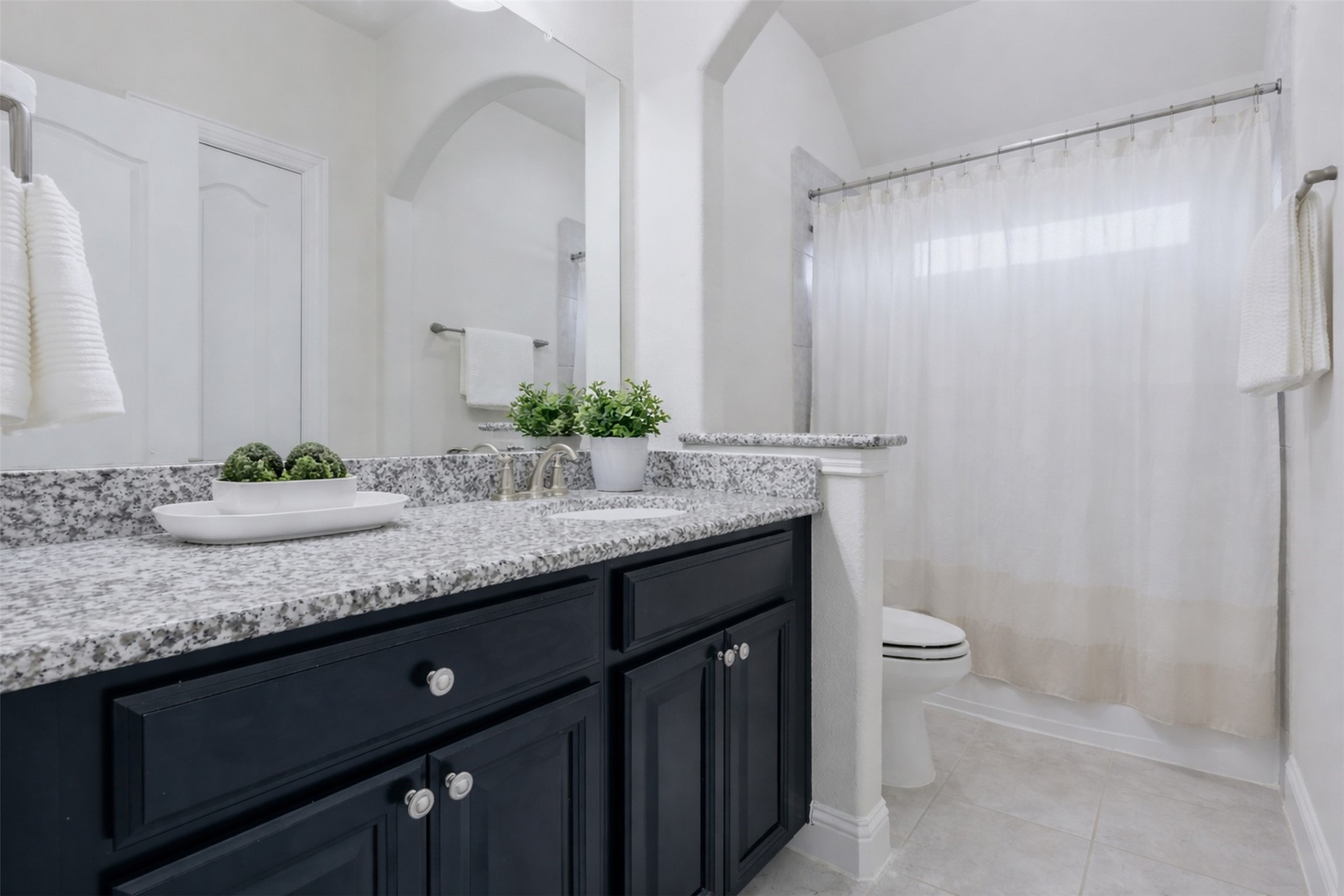 9926 Common Hawker Court Conroe, TX 77385 - Photo 29 of 40 Secondary Bathroom: GRANITE countertops with a shower/tub combo