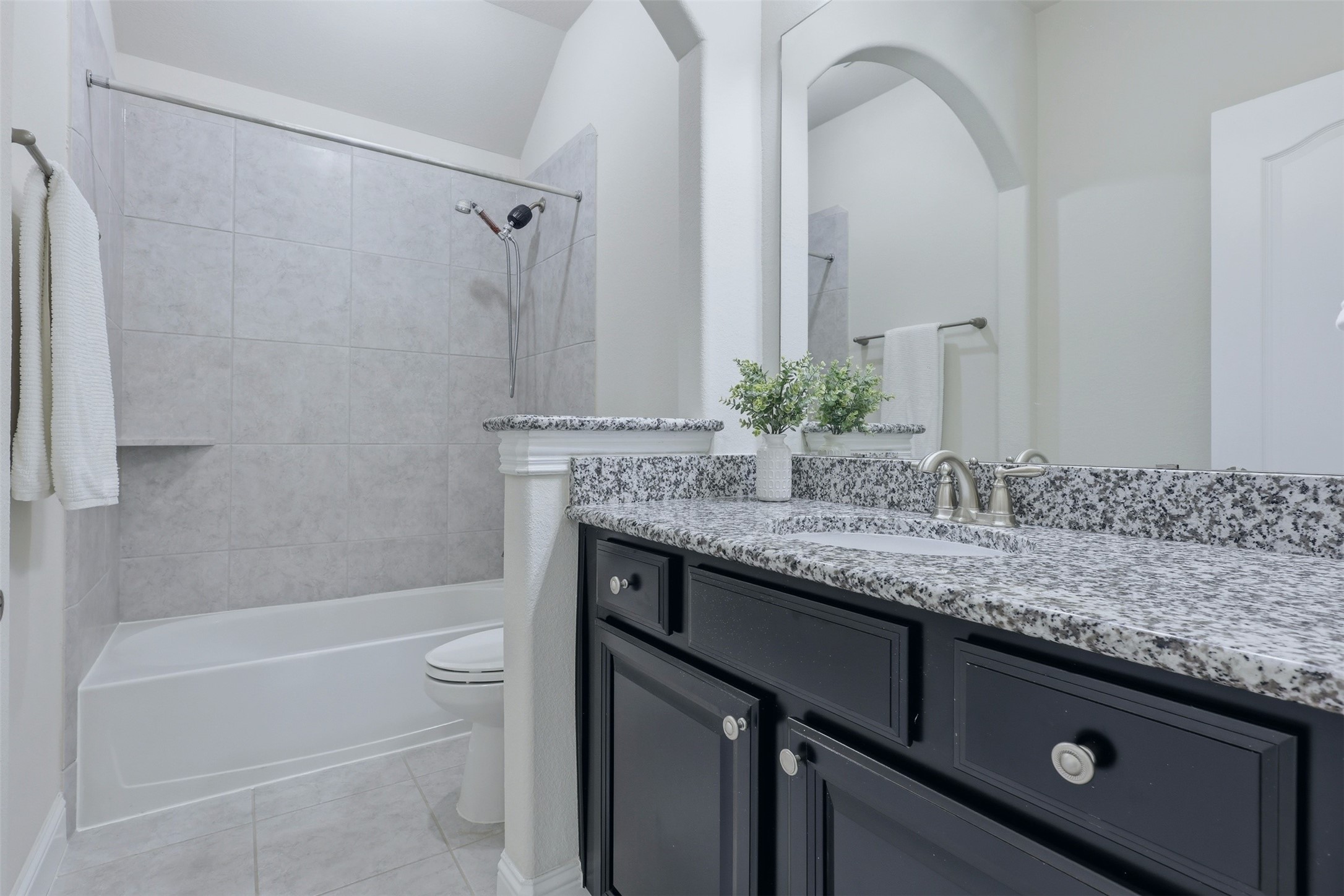 9926 Common Hawker Court Conroe, TX 77385 - Photo 31 of 40 Secondary Bathroom: GRANITE countertops with a shower/tub combo