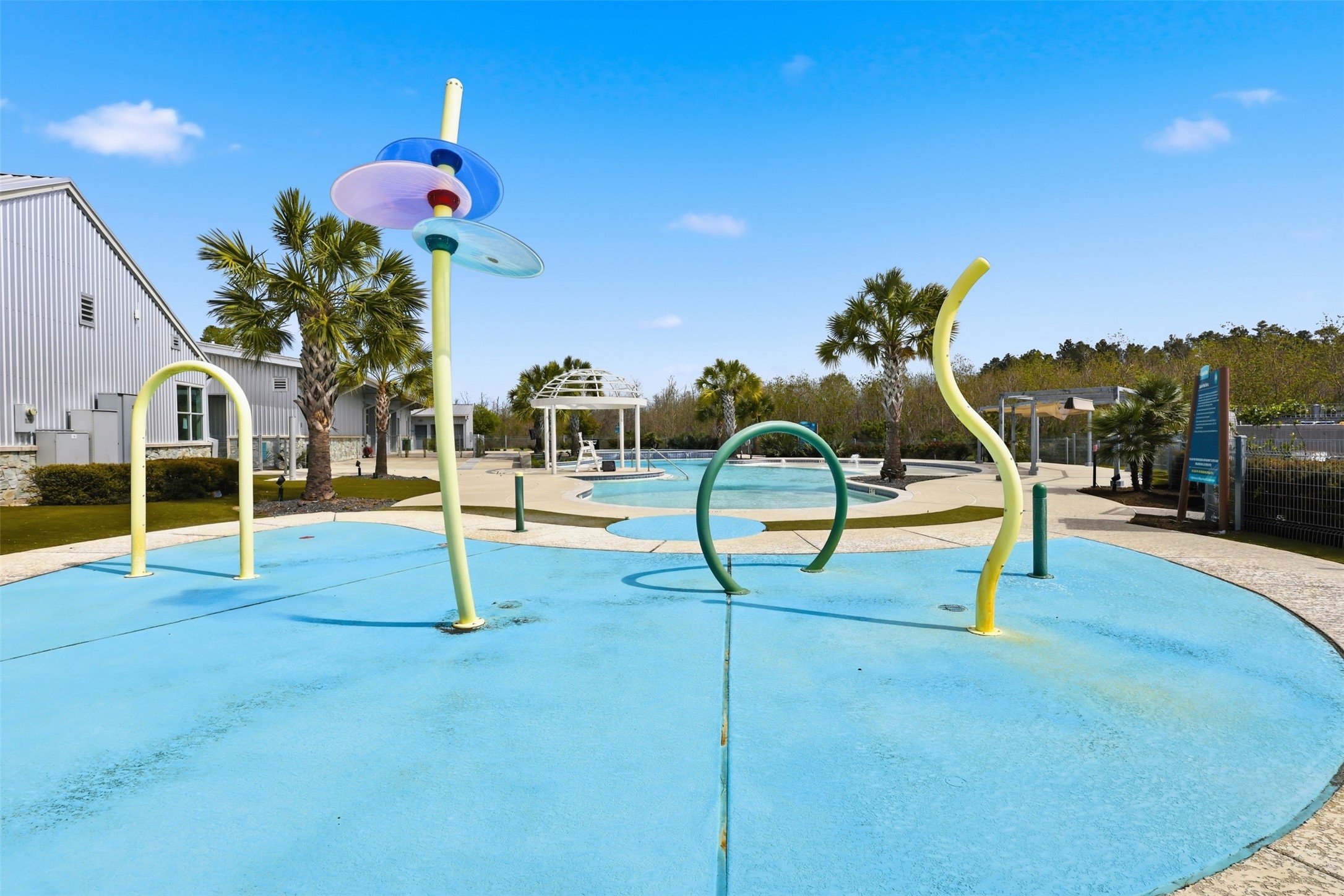 9926 Common Hawker Court Conroe, TX 77385 - Photo 35 of 40 Harper's Preserve Neighborhood Amenities Include a SPLASHPAD