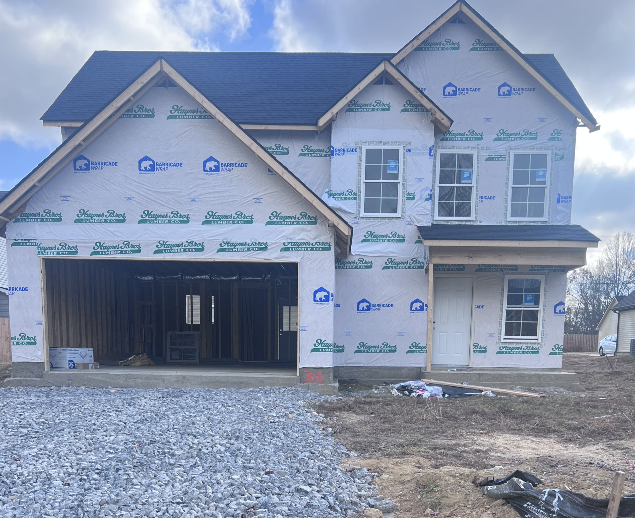 258 Timber Circle Manchester, TN 37355 - Photo 2 of 11 a view of a house with a yard and garage