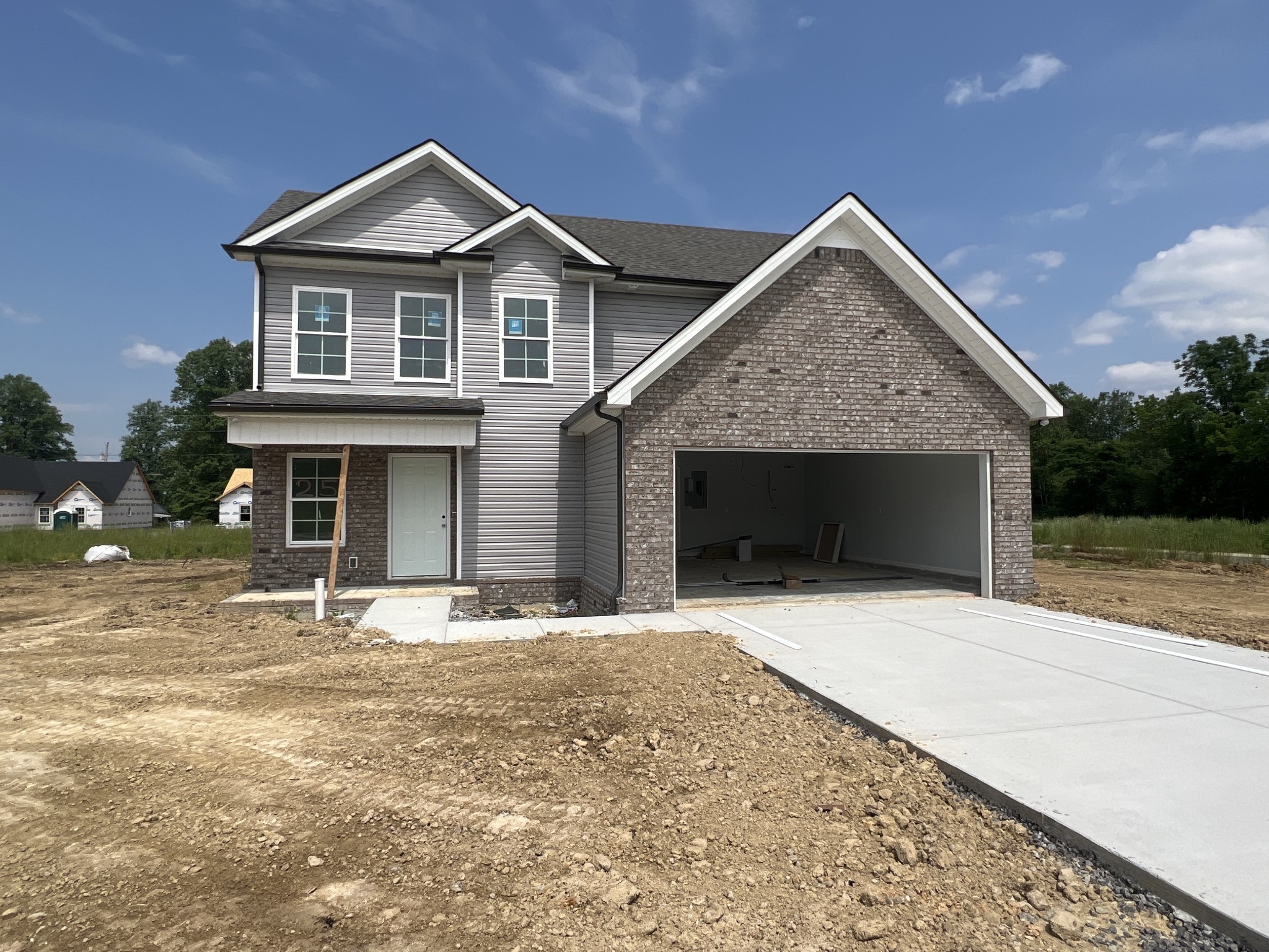 258 Timber Circle Manchester, TN 37355 - Photo 3 of 11 a front view of a house with a yard