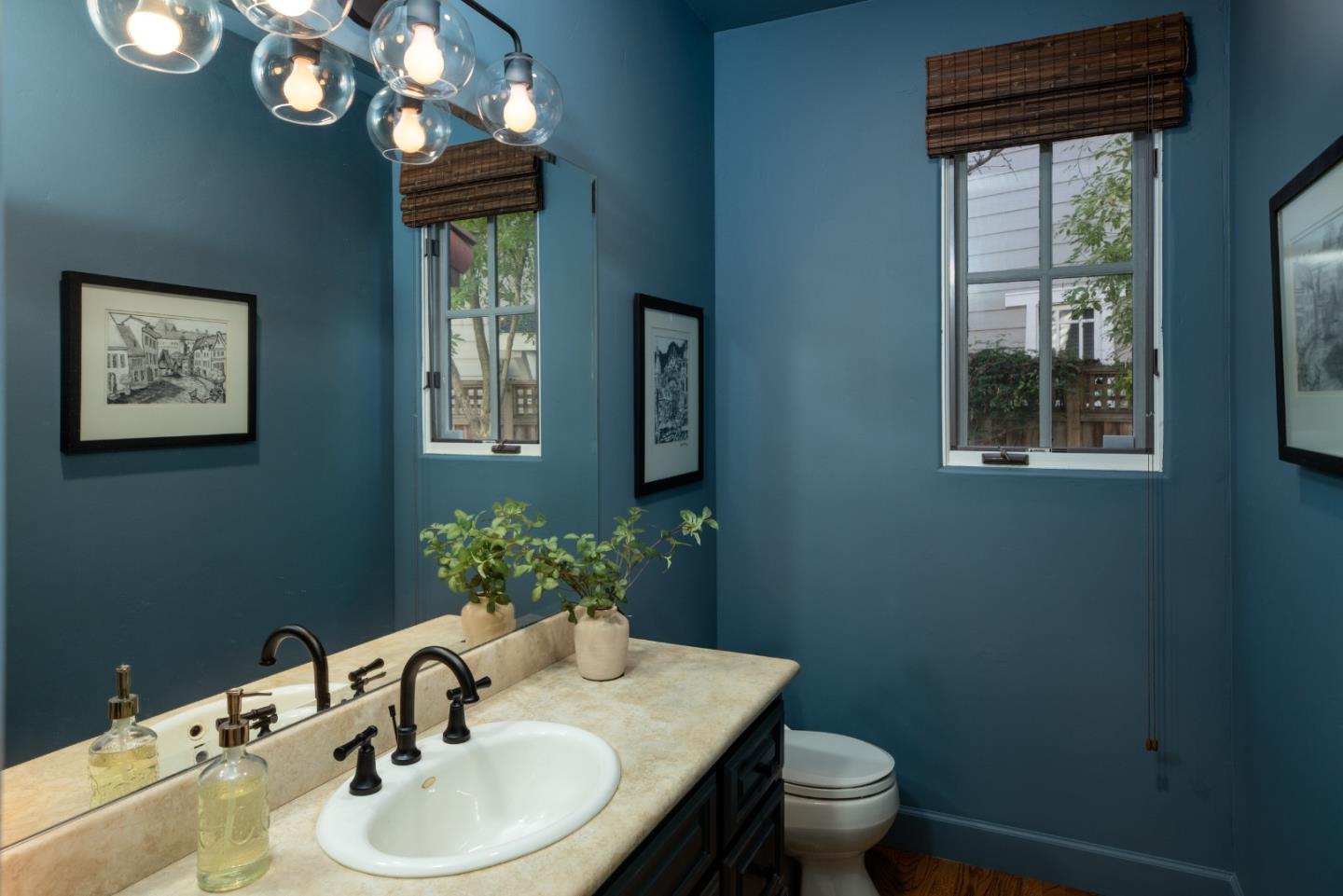 119 Boyer Lane Los Gatos, CA 95030 - Photo 16 of 33 a bathroom with a toilet a sink and mirror