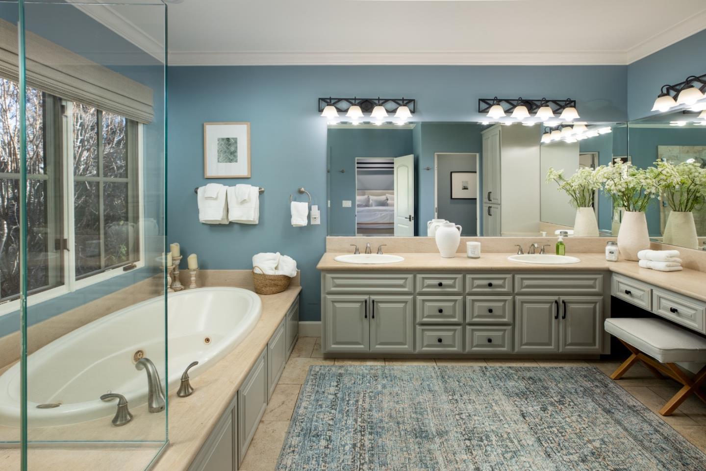 119 Boyer Lane Los Gatos, CA 95030 - Photo 20 of 33 a bathroom with a tub sink and mirror