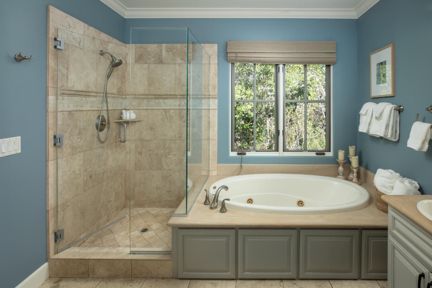 119 Boyer Lane Los Gatos, CA 95030 - Photo 21 of 33 a white bath tub sitting next to a shower