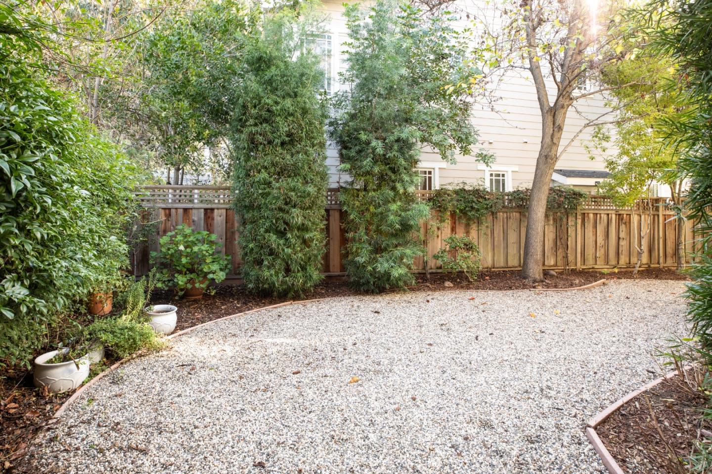 119 Boyer Lane Los Gatos, CA 95030 - Photo 32 of 33 a pathway of a house with a yard and wooden fence