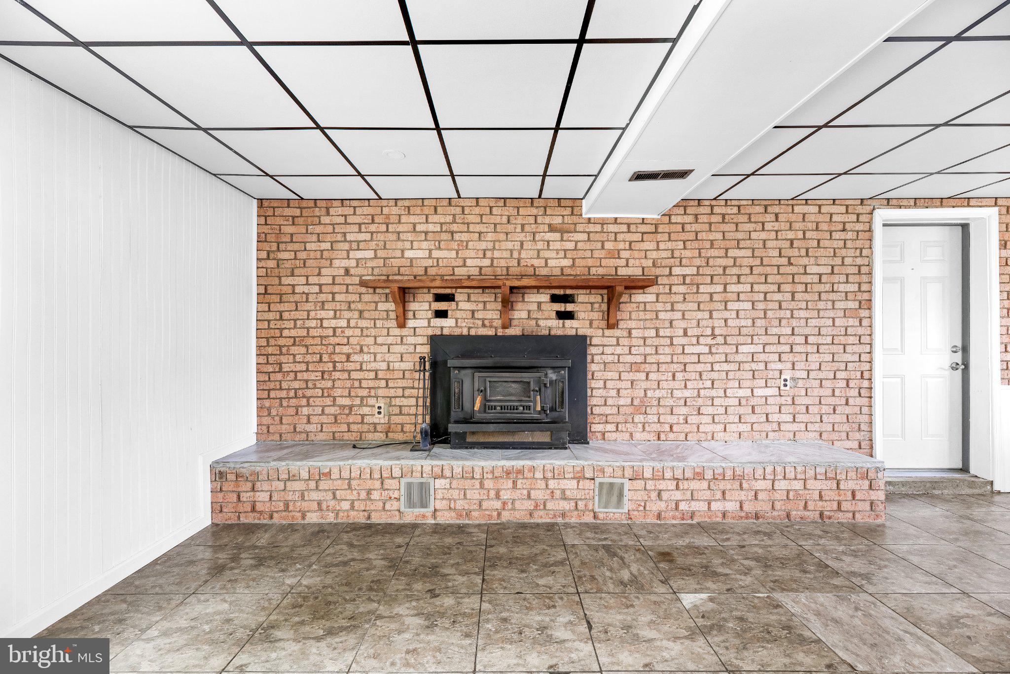 11951 Prince Court Dunkirk, MD 20754 - Photo 25 of 72 Cozy brick fireplace in spacious room.