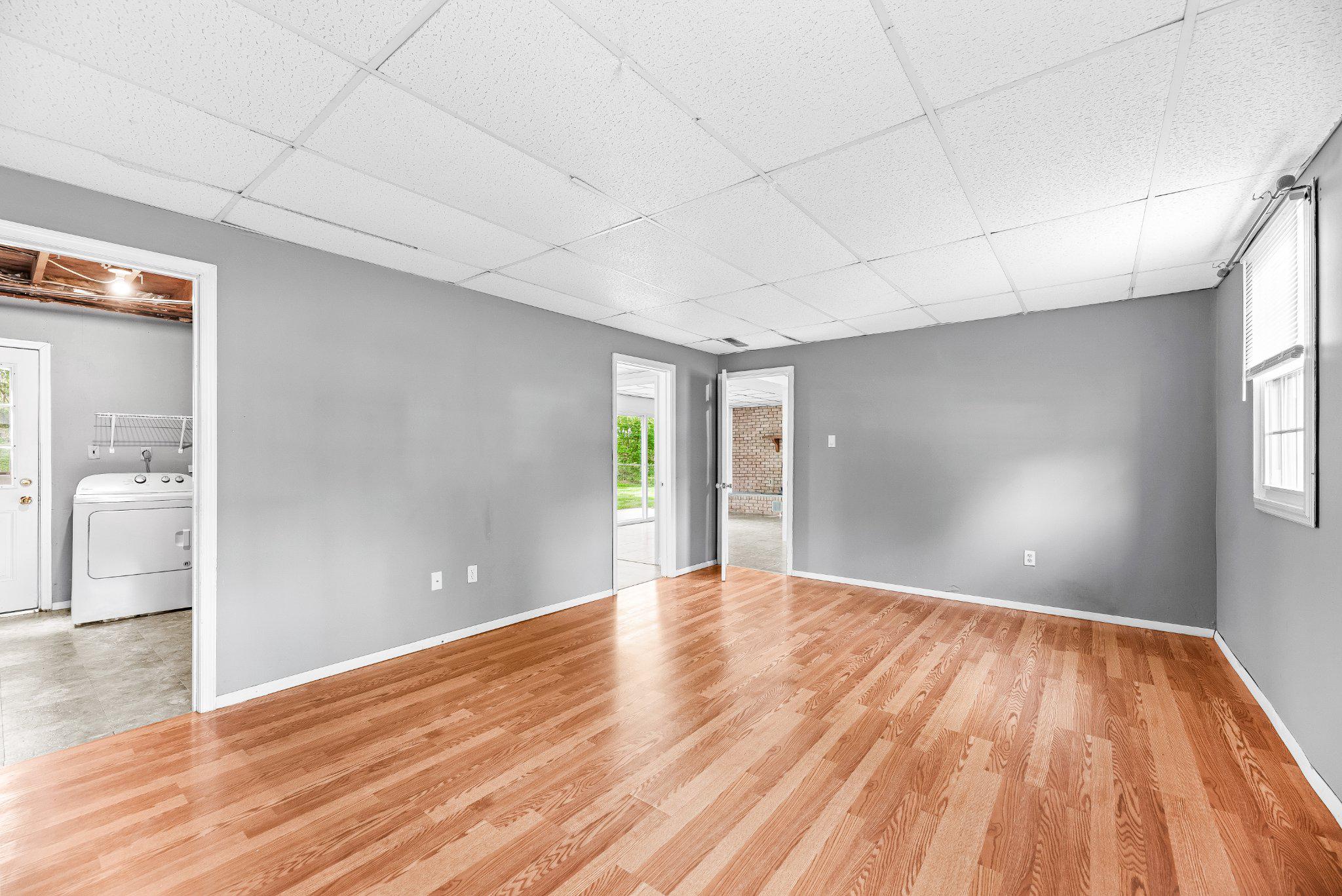 11951 Prince Court Dunkirk, MD 20754 - Photo 31 of 72 a view of an empty room with window and wooden floor