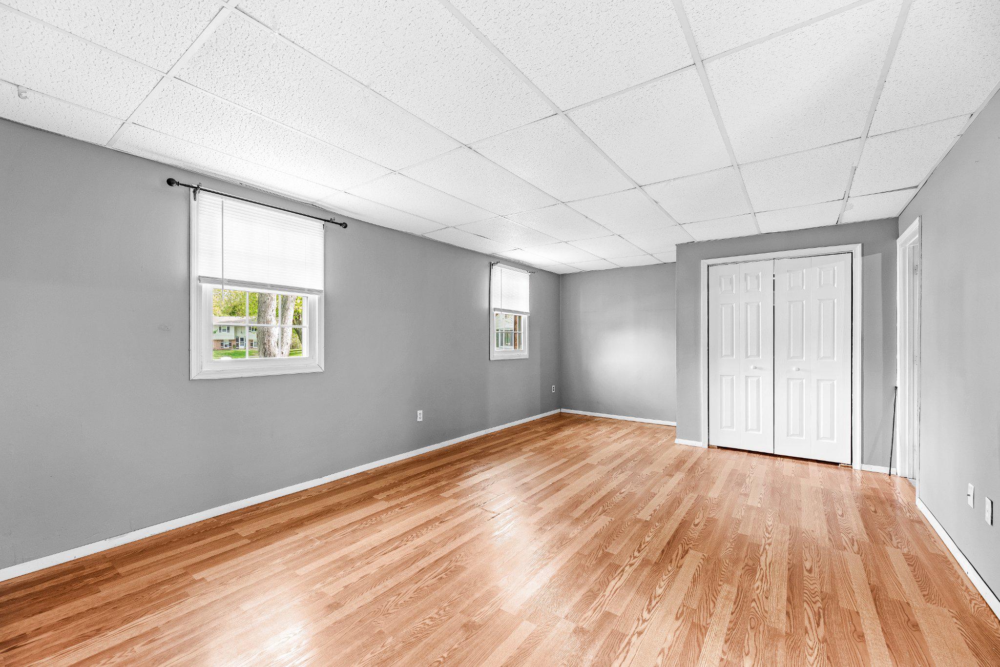 11951 Prince Court Dunkirk, MD 20754 - Photo 33 of 72 a view of an empty room with wooden floor and a window