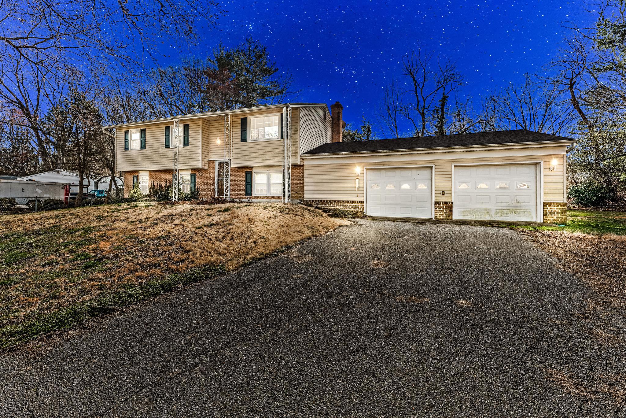 11951 Prince Court Dunkirk, MD 20754 - Photo 40 of 72 a front view of a house with a yard