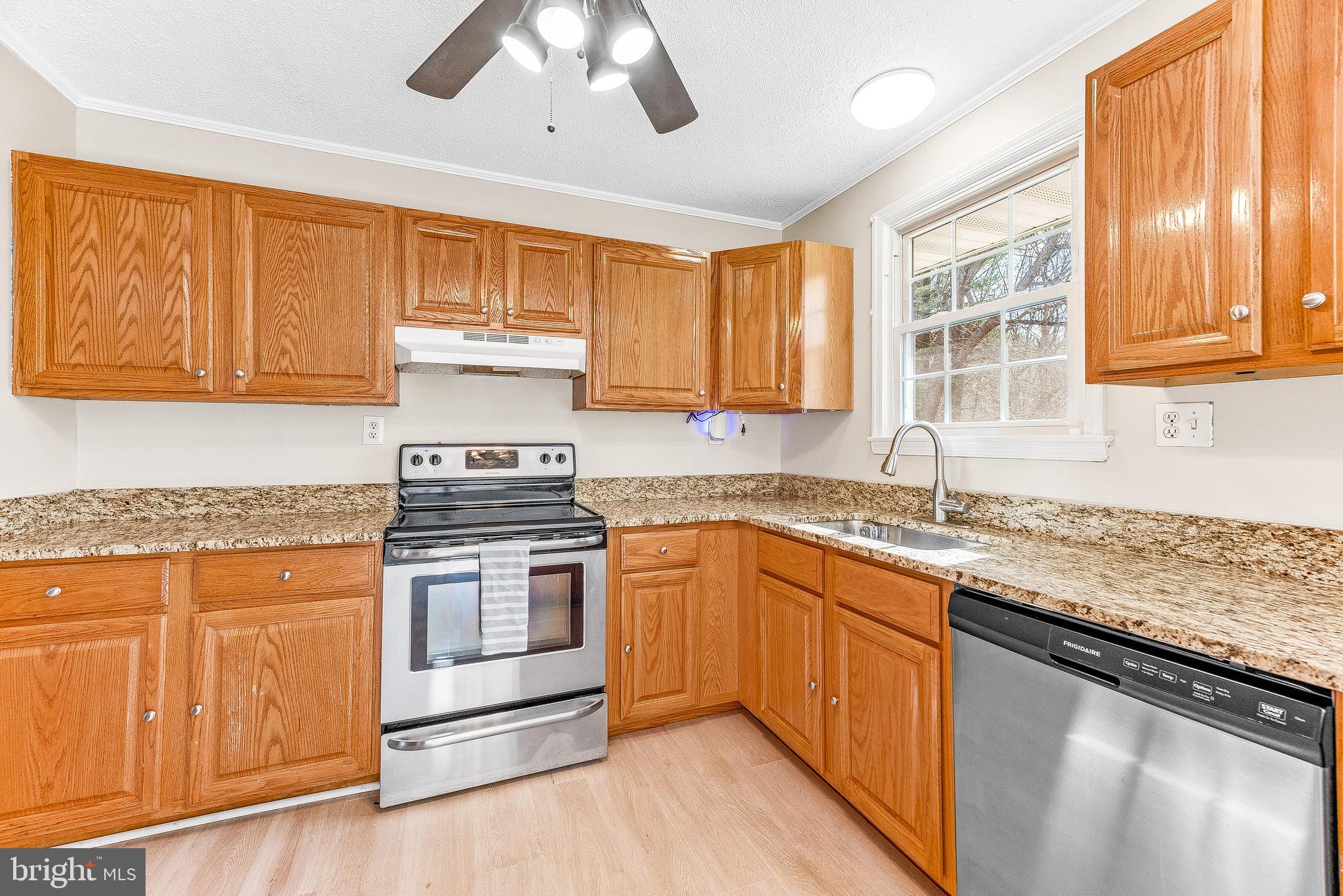 11951 Prince Court Dunkirk, MD 20754 - Photo 57 of 72 a kitchen with stainless steel appliances granite countertop a stove and a sink