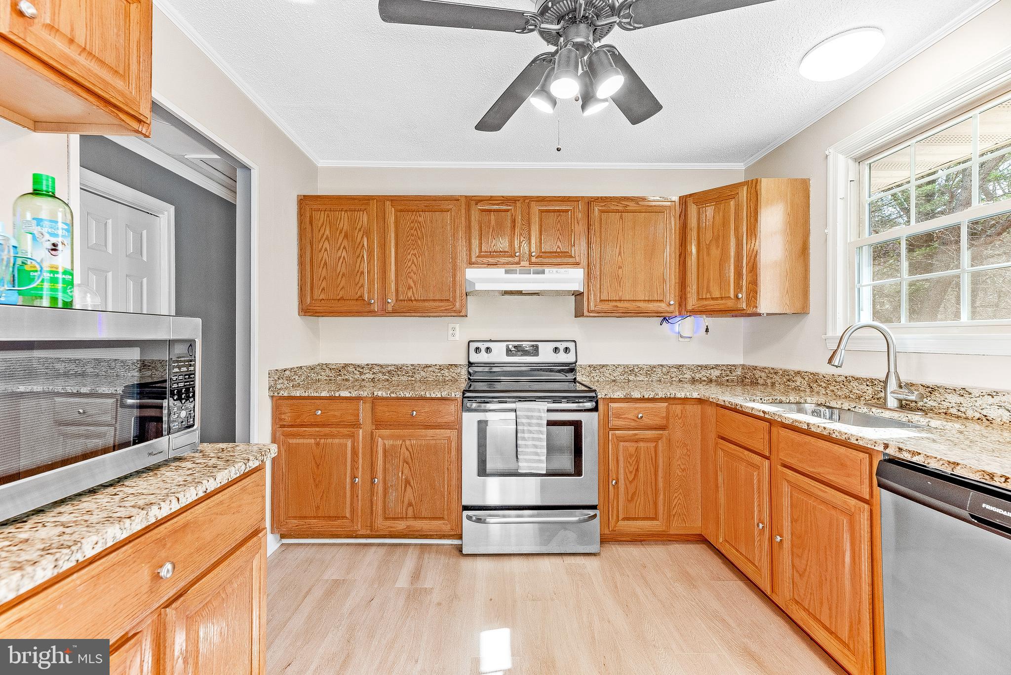 11951 Prince Court Dunkirk, MD 20754 - Photo 58 of 72 a kitchen with stainless steel appliances granite countertop a stove and cabinets