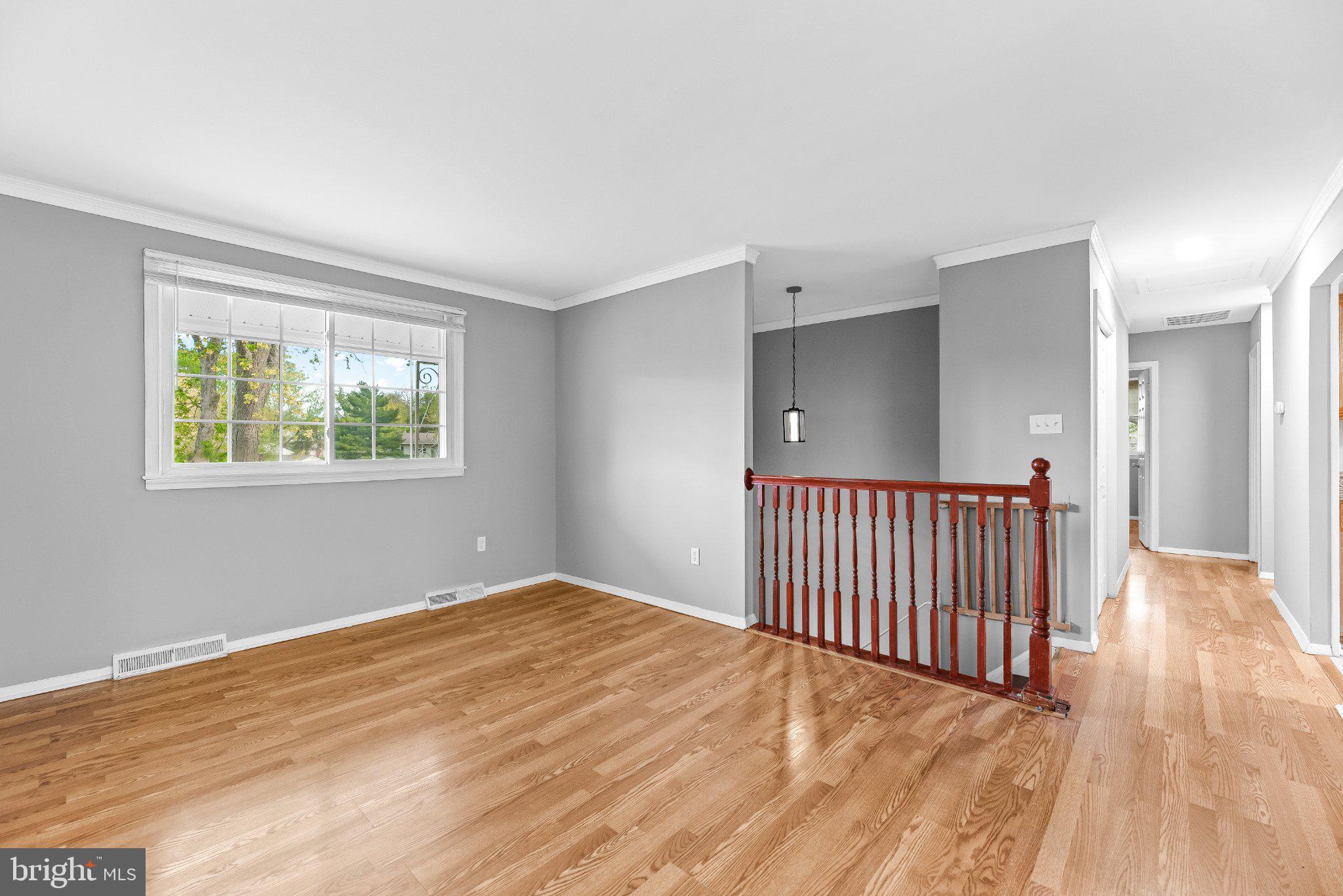 11951 Prince Court Dunkirk, MD 20754 - Photo 6 of 72 a view of a livingroom with wooden floor and a window