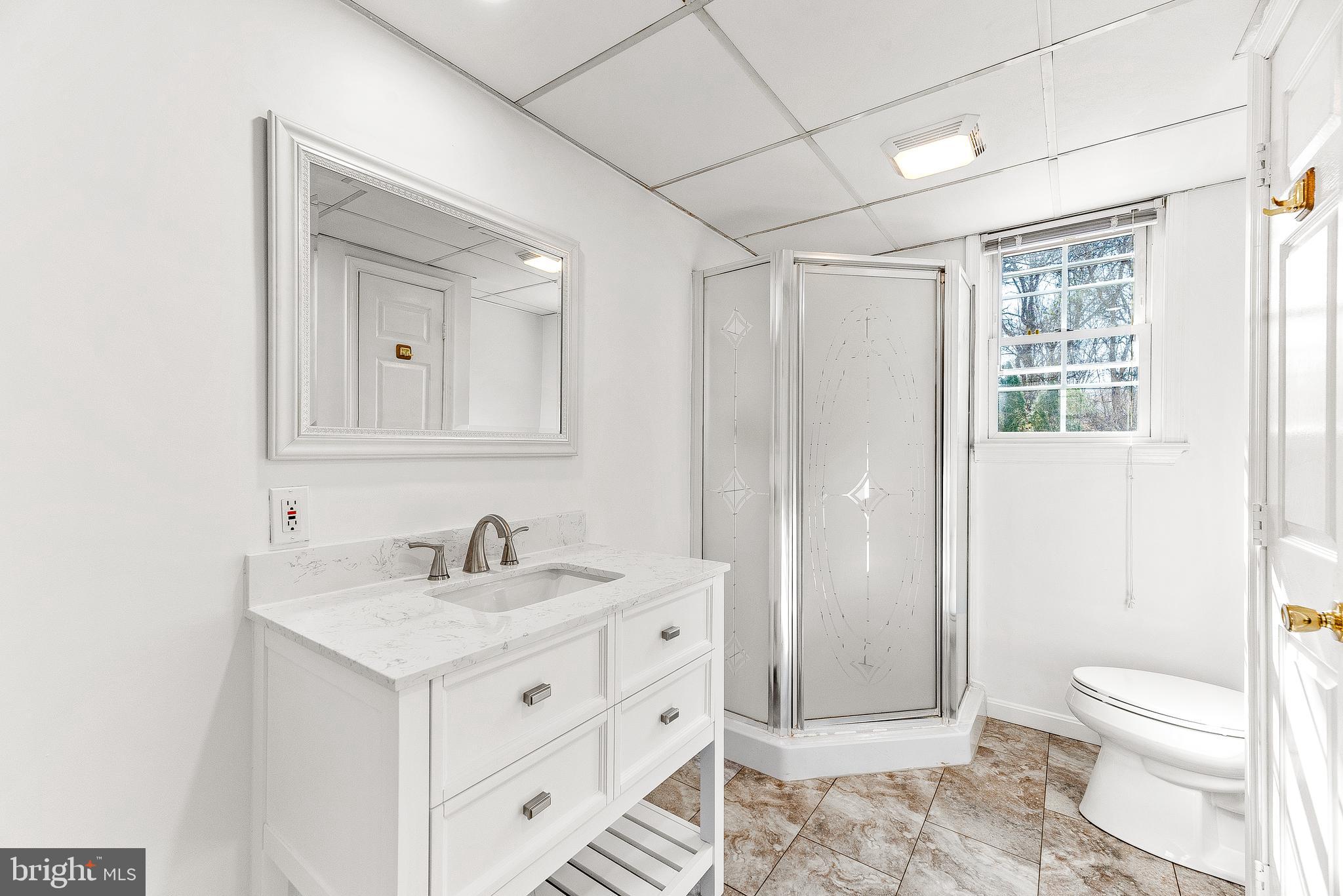 11951 Prince Court Dunkirk, MD 20754 - Photo 64 of 72 a bathroom with a sink a toilet and shower