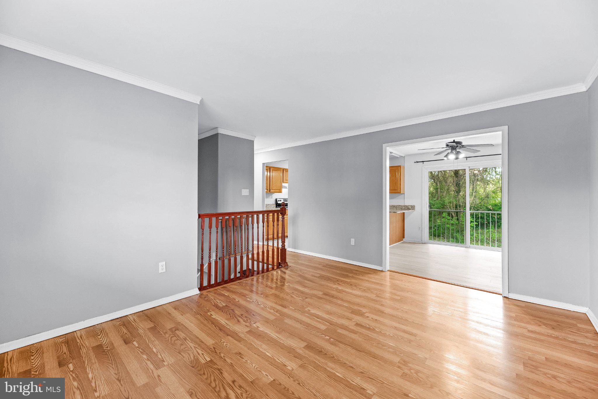 11951 Prince Court Dunkirk, MD 20754 - Photo 7 of 72 a view of an empty room with wooden floor and a window